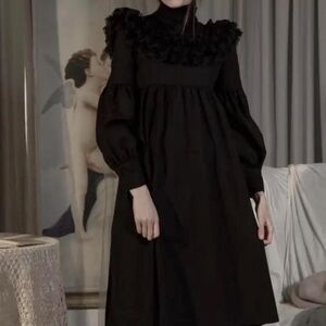 Black gothic dress with ruffle collar and long puffy sleeves